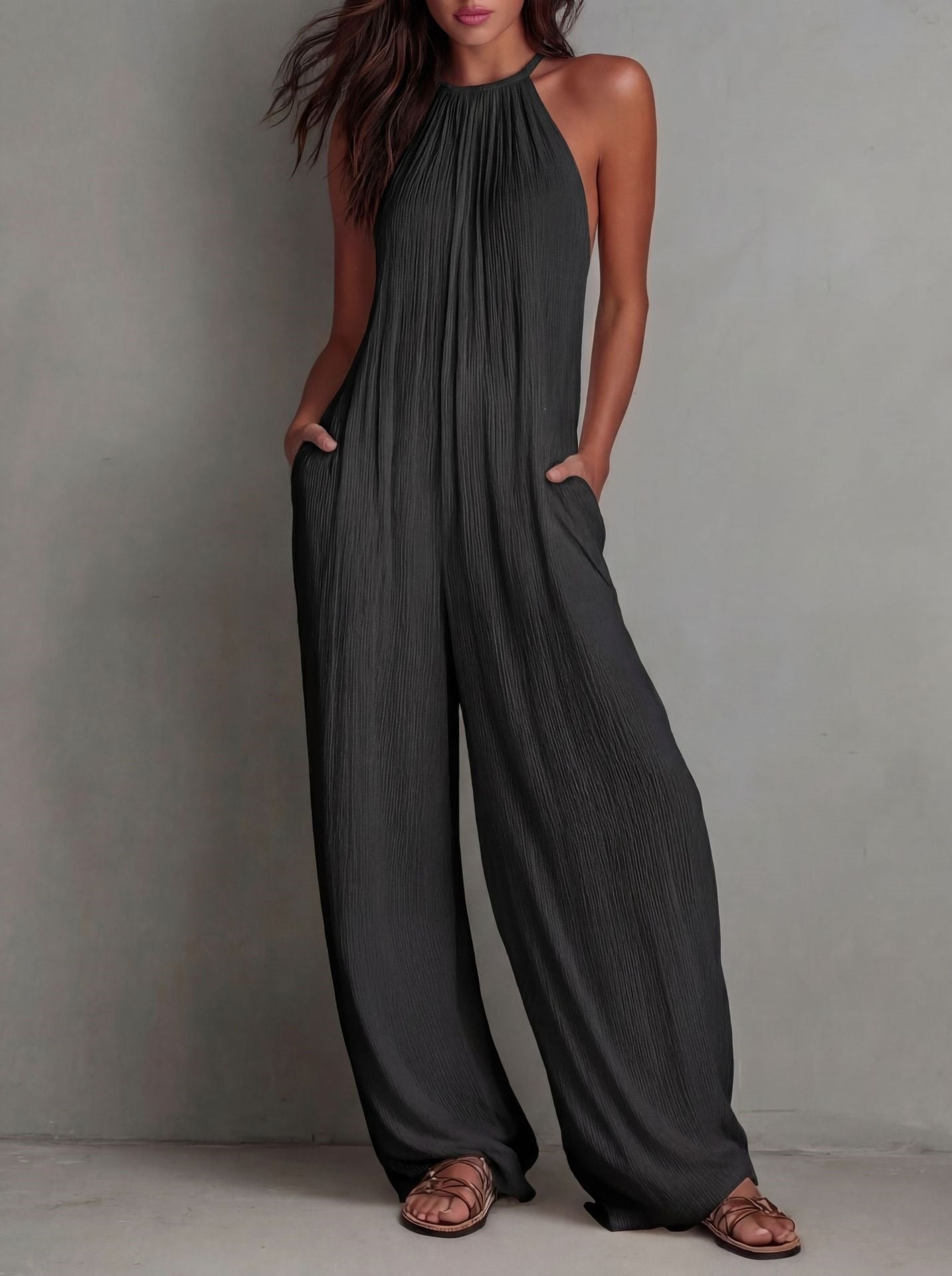 Pleated Resort-Style Jumpsuit with Open Back and Wide-Leg Trousers
