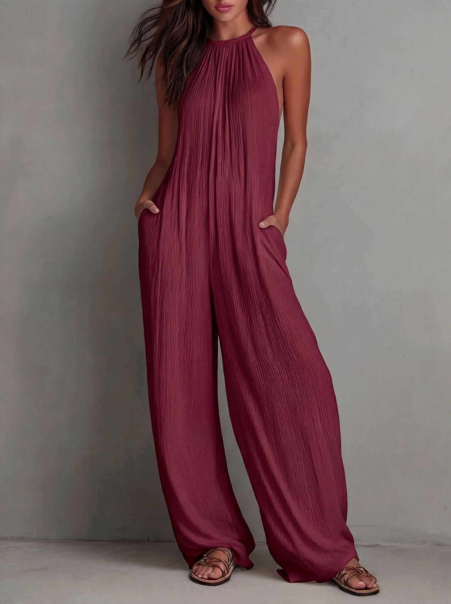 Pleated Resort-Style Jumpsuit with Open Back and Wide-Leg Trousers