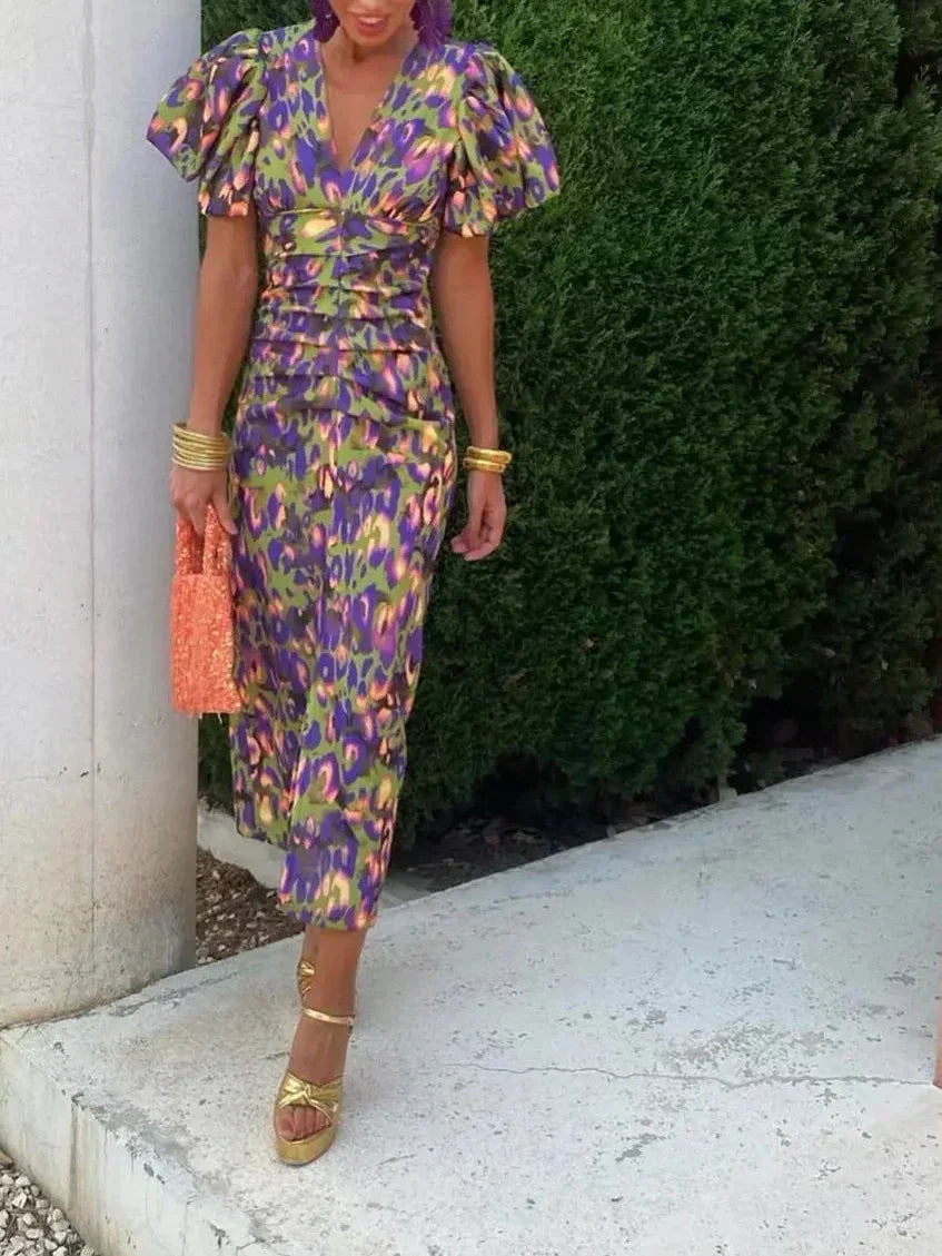 Noor™ – Midi dress with puff sleeves