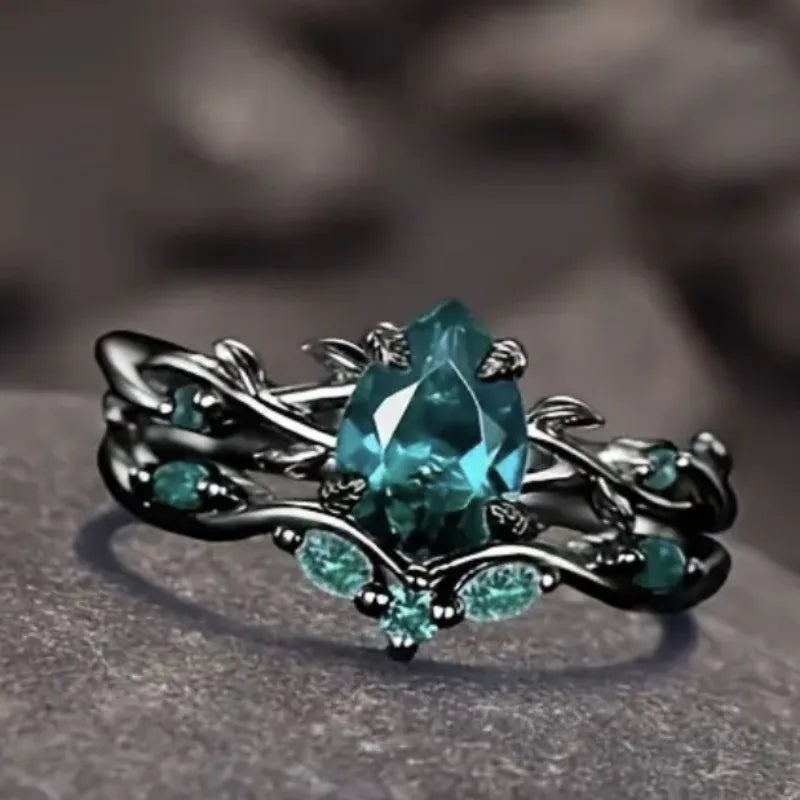 Black Ring with Inlaid with Ocean Green Stones