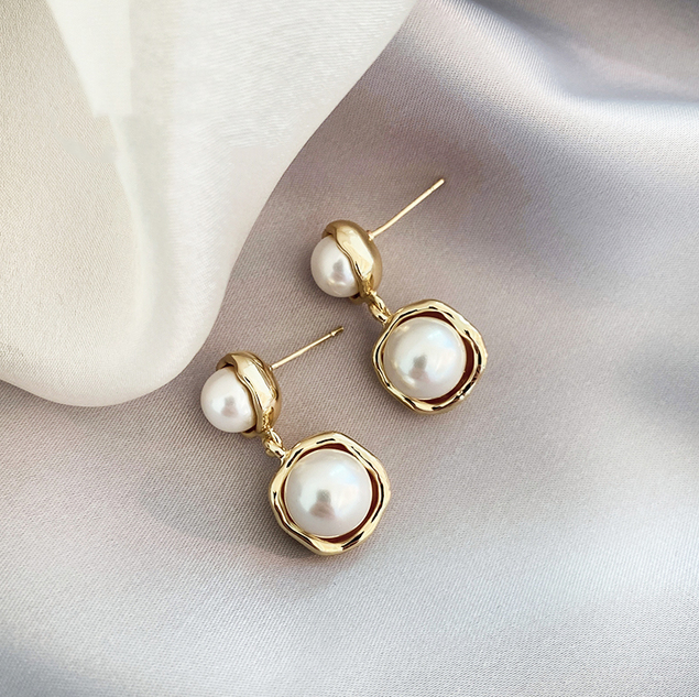 Gold petal earrings in vintage style